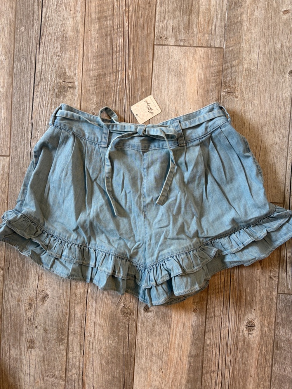 Free People denim elastic waist bow tie ruffled shorts NWT Sz S
